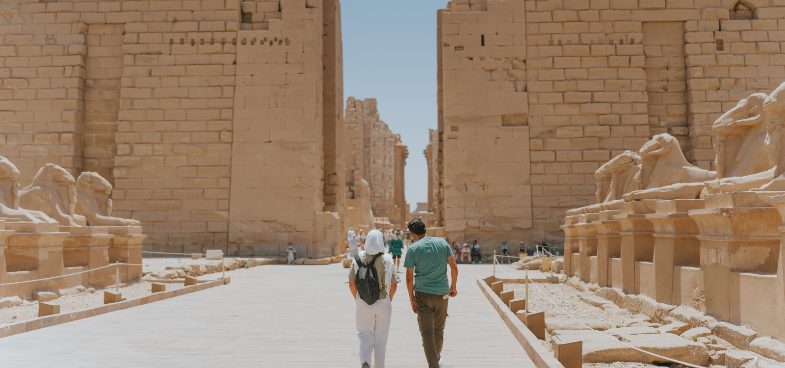 Tourists looking at a temple in Luxor