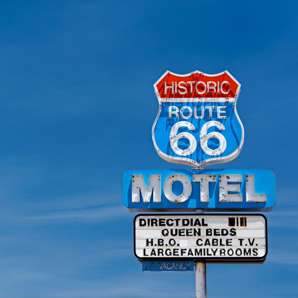 A motel sign with the words Historic Route 66